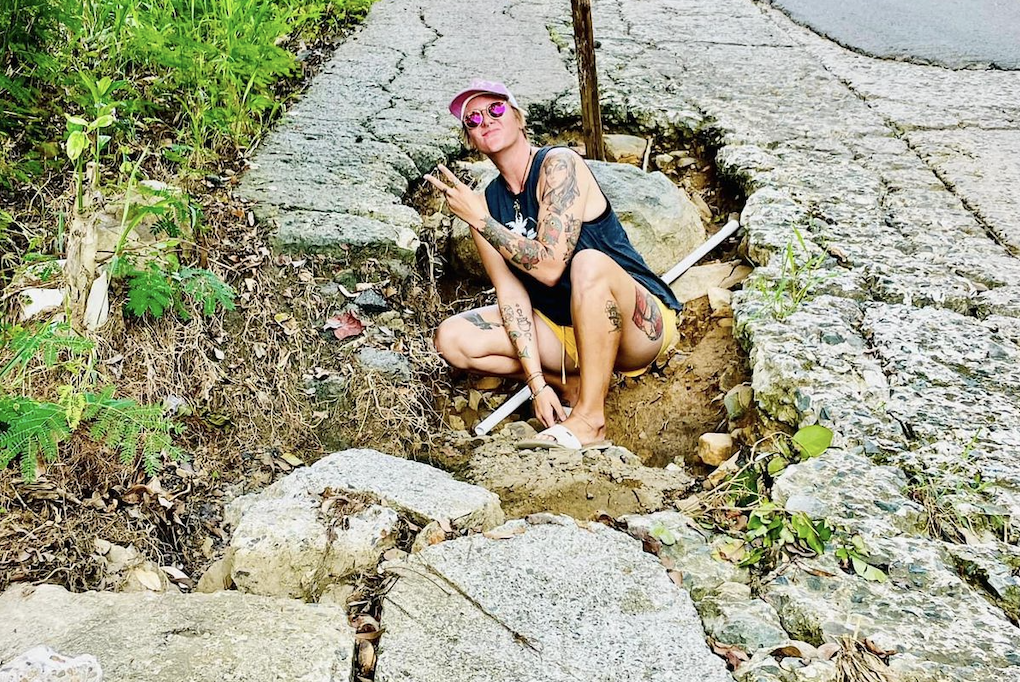 Dozens react to massive pothole on Brewers Bay road